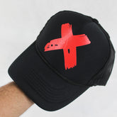 Black Trucker Cap with Bold Red X Design