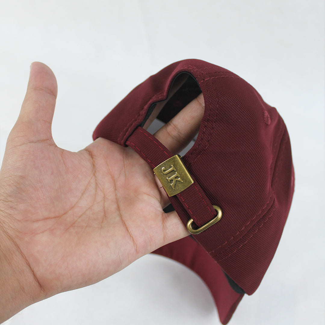 Structured Burgundy Cap with Geometric Logo